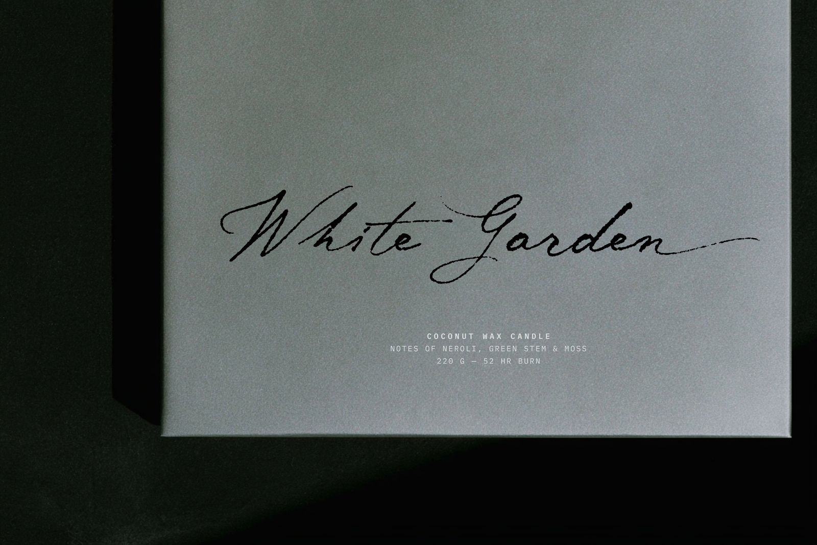 Midnight Symphony font on charcoal candle packaging mockup